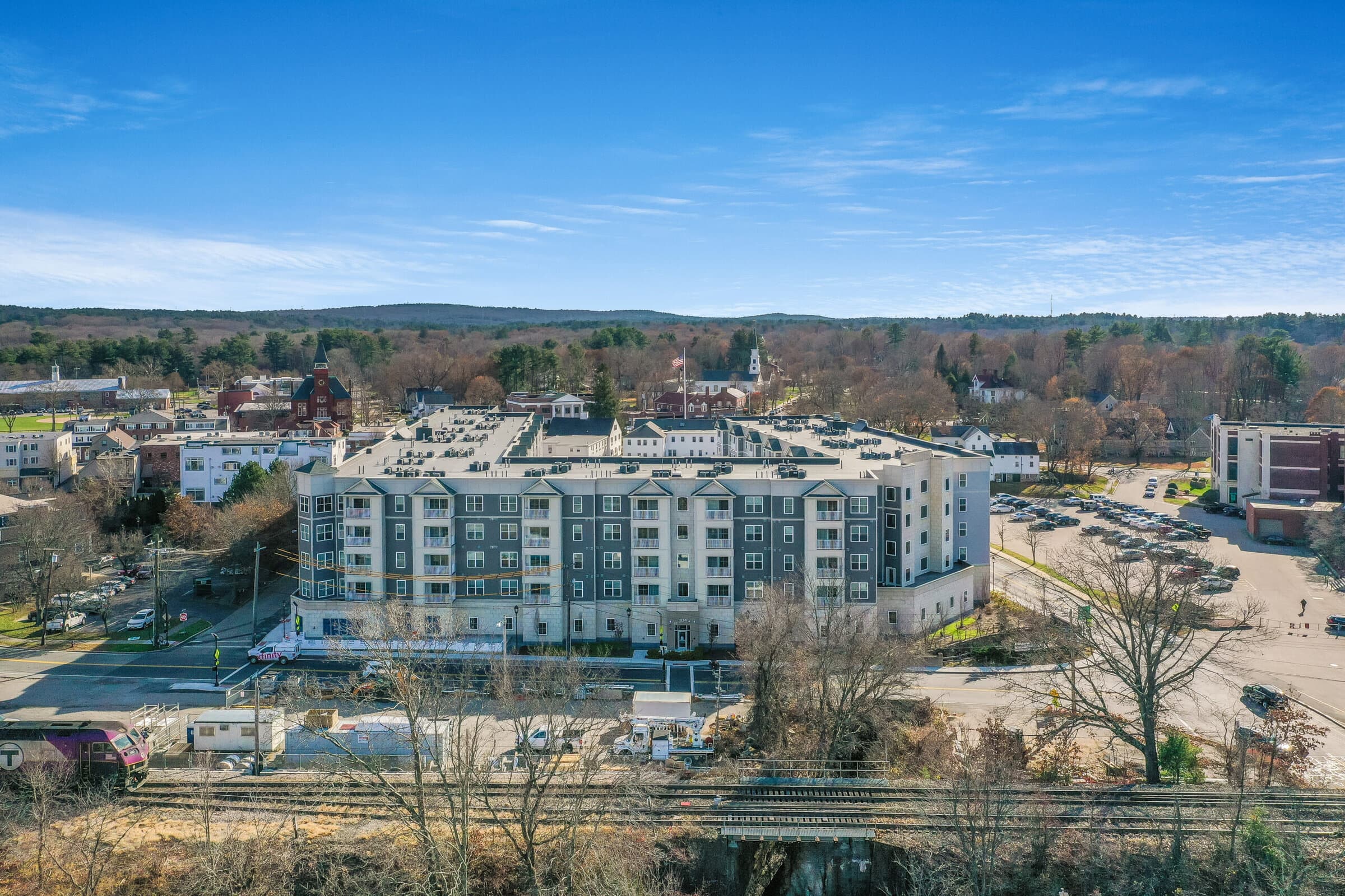 Liberty Station's facade in the heart of Walpole Center, beside the Franklin Line commuter rail.